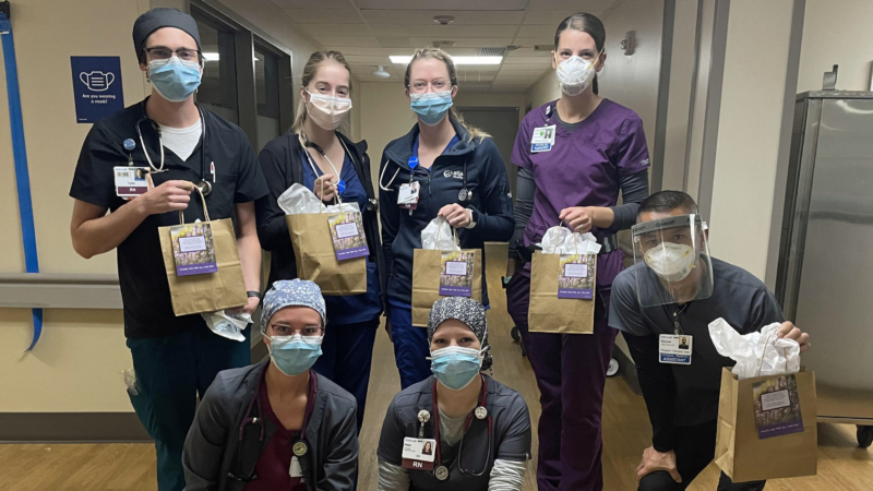 Code Lavender team members with gift bags