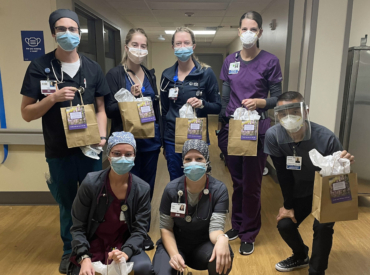 Code Lavender team members with gift bags