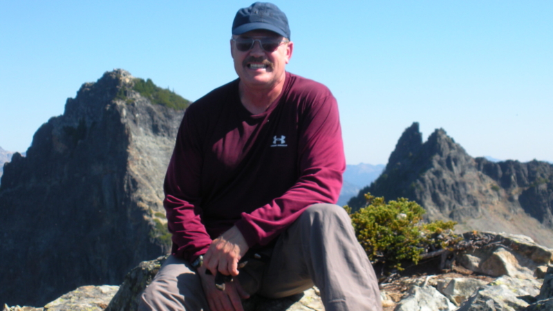Dan sitting on rock at Pinacle Peak