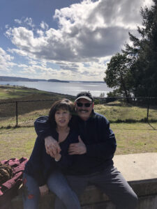Dan and wife in front of Chambers Bay