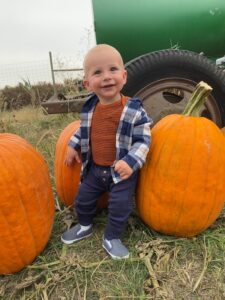 NICU graduate Jaxson at a pumpkin patch