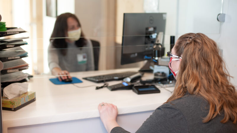 Patient at MultiCare Health System check-in desk