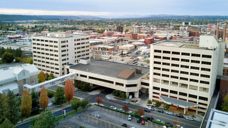 White multi-level building in downtown area